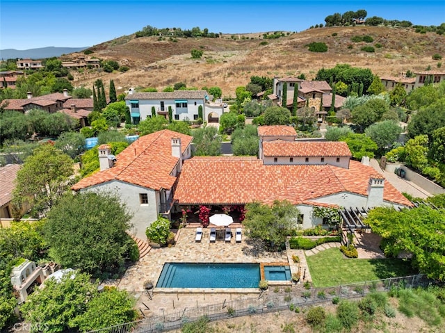 drone / aerial view featuring a mountain view