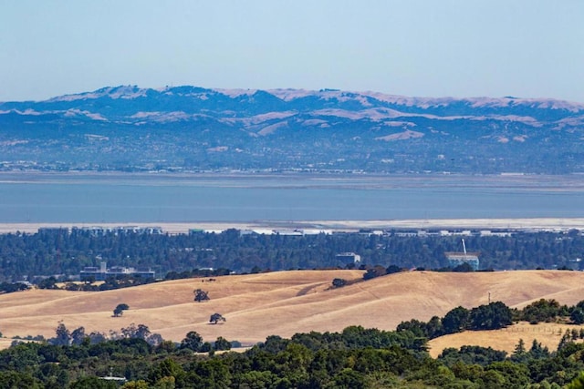 view of mountain feature featuring a water view