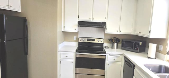 kitchen featuring white cabinets, stainless steel appliances, and exhaust hood