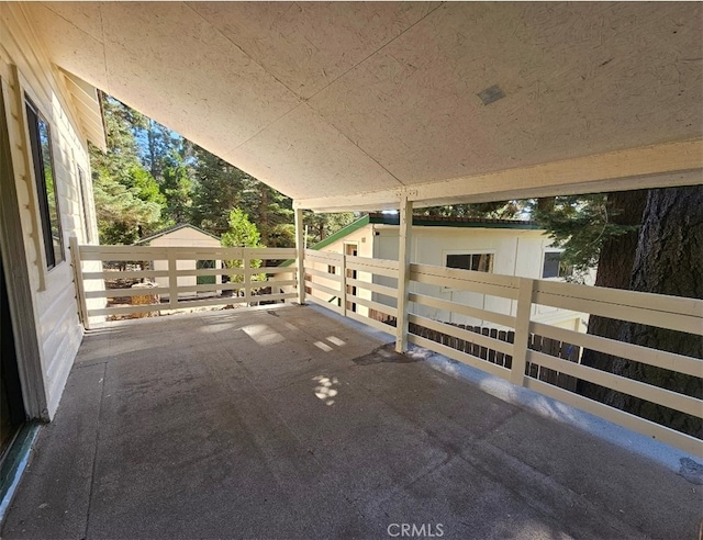 view of patio with a balcony