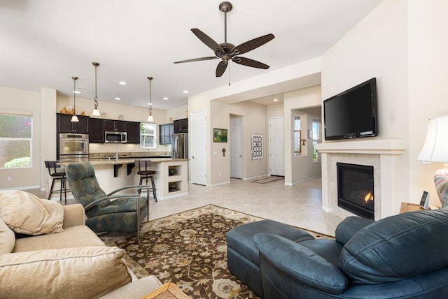 living room with ceiling fan