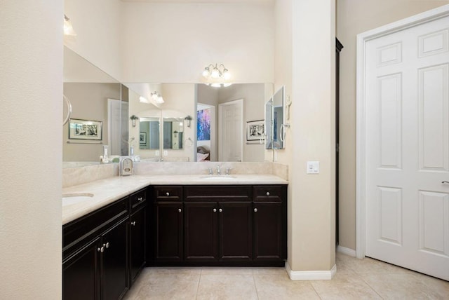 bathroom featuring tile patterned floors and vanity