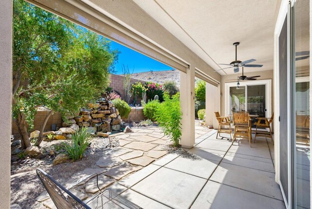 view of patio with ceiling fan