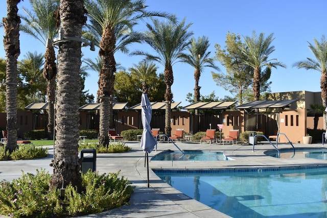 view of swimming pool with a patio