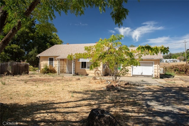 ranch-style home with a garage