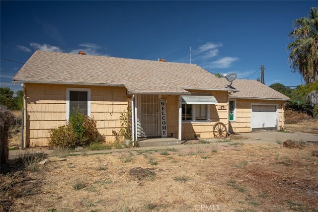 ranch-style home with a garage