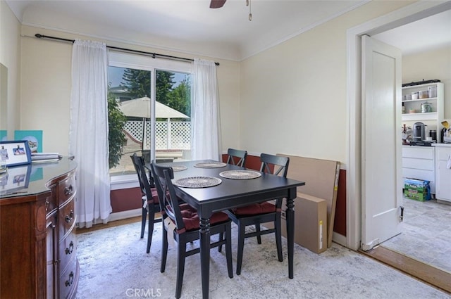 dining room featuring ceiling fan