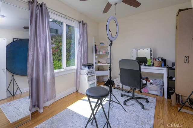 office space with hardwood / wood-style floors, ceiling fan, and a healthy amount of sunlight