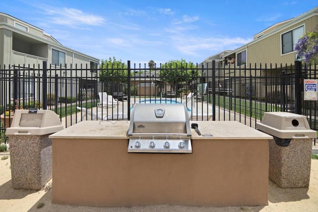 view of patio / terrace with area for grilling and an outdoor kitchen