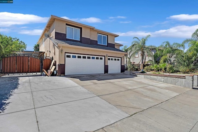 view of front of property with a garage