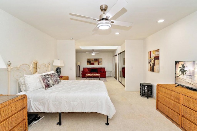 carpeted bedroom featuring ceiling fan