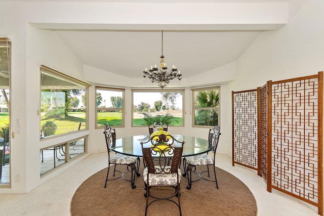 dining area featuring light carpet, an inviting chandelier, and lofted ceiling with beams