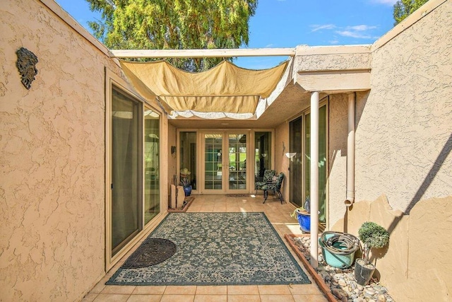 property entrance with french doors