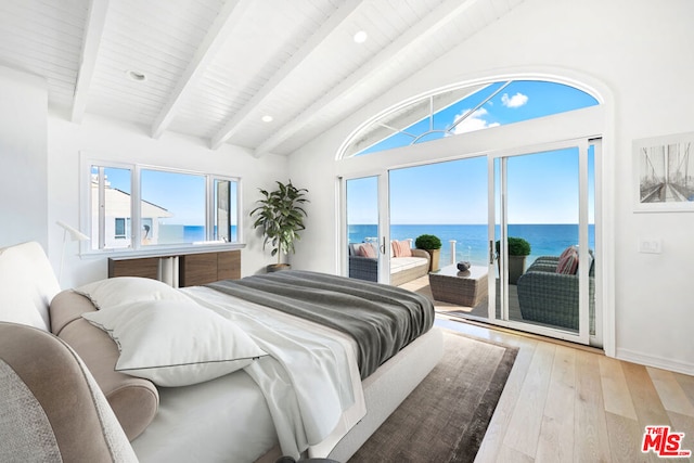 bedroom with light hardwood / wood-style floors, access to exterior, vaulted ceiling with beams, a water view, and wooden ceiling