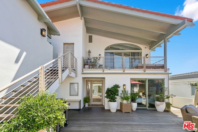 doorway to property featuring a balcony