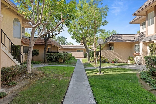 view of community with a lawn