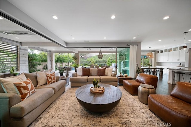 living room with hardwood / wood-style flooring and plenty of natural light