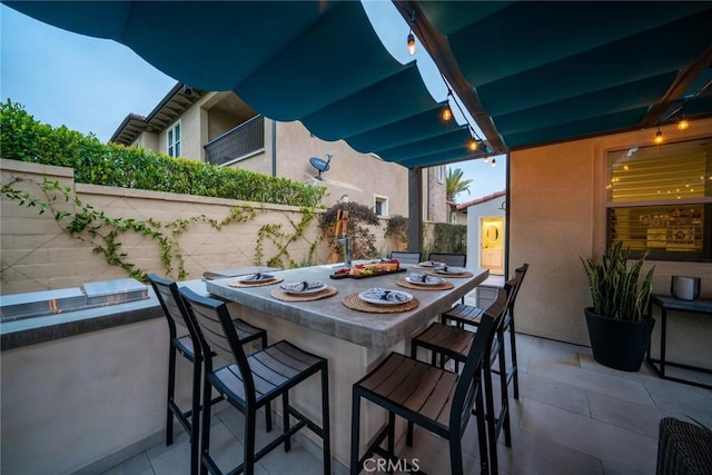 view of patio featuring a bar