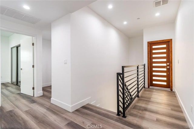 hall featuring light hardwood / wood-style flooring