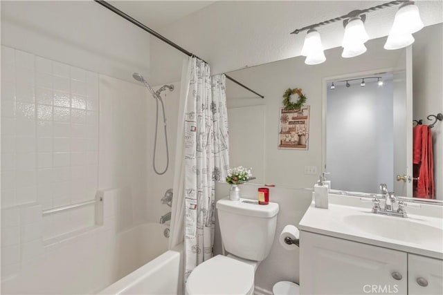 full bathroom featuring vanity, toilet, and shower / tub combo with curtain