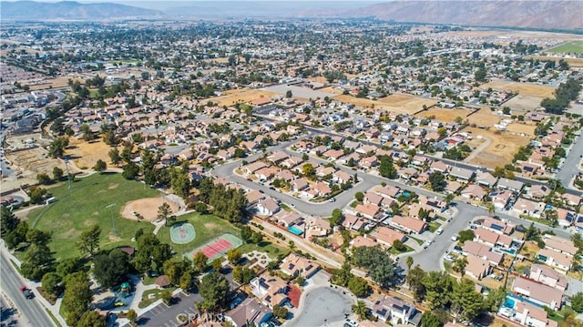 birds eye view of property with a mountain view