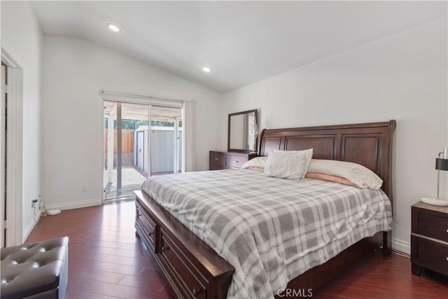 bedroom featuring access to outside, vaulted ceiling, and dark hardwood / wood-style floors