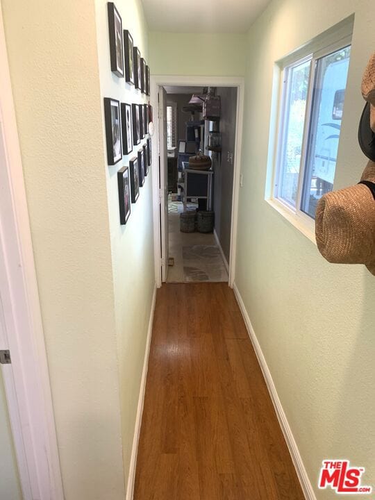 corridor featuring hardwood / wood-style flooring