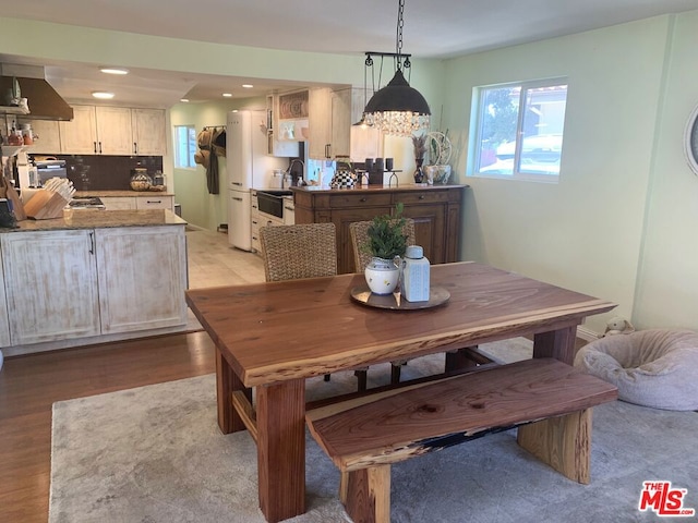 dining area with light wood-type flooring