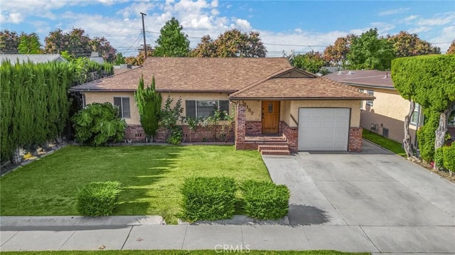 ranch-style home with a garage and a front yard