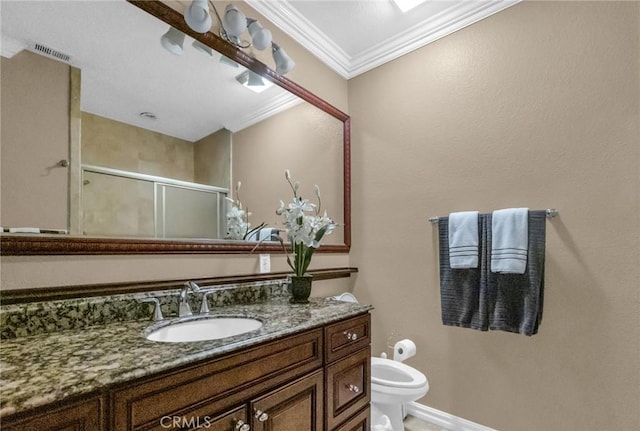 bathroom with crown molding, vanity, an enclosed shower, and toilet