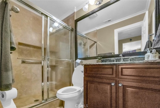 bathroom with vanity, toilet, walk in shower, and crown molding