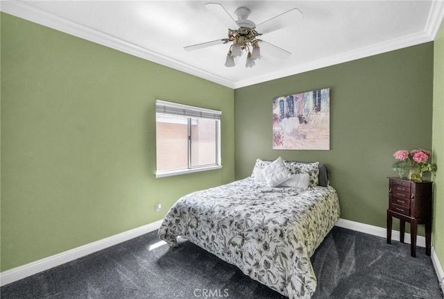 bedroom featuring dark colored carpet, ceiling fan, and crown molding