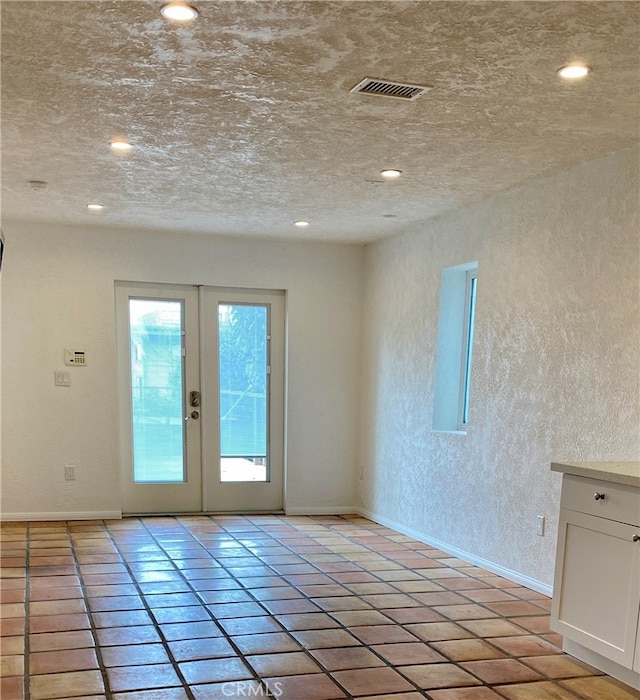 doorway to outside featuring french doors