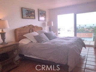 bedroom featuring tile patterned flooring