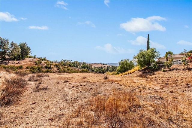 view of landscape with a rural view