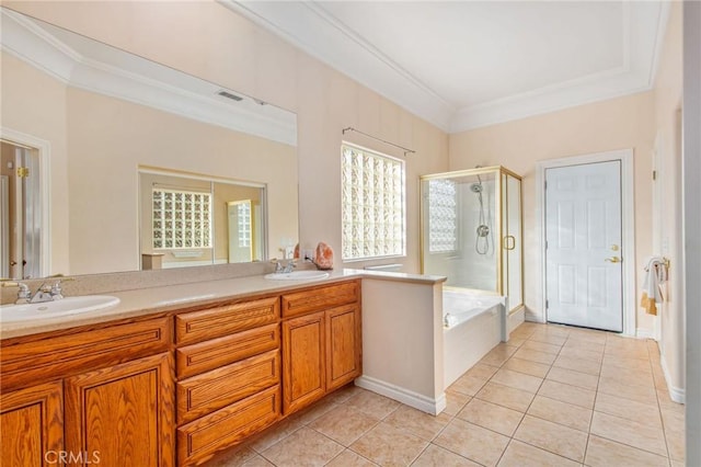 bathroom with tile patterned flooring, vanity, crown molding, and independent shower and bath