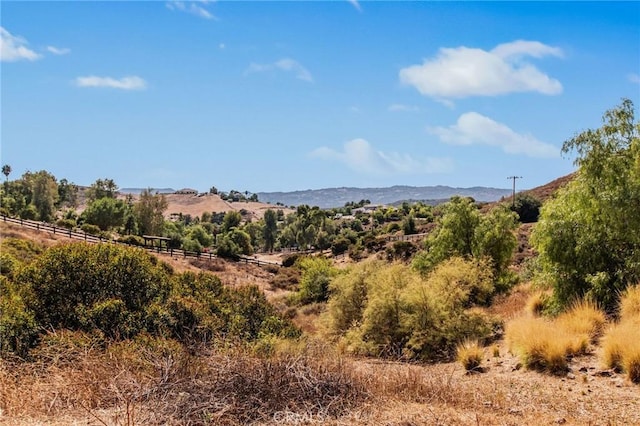 view of mountain feature with a rural view