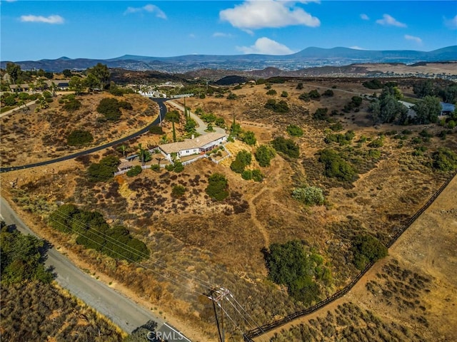 drone / aerial view featuring a mountain view