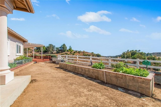 view of yard with a pergola