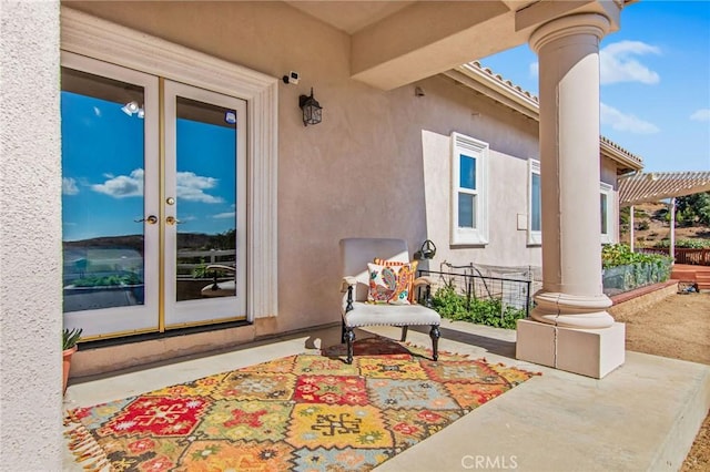 view of patio featuring french doors