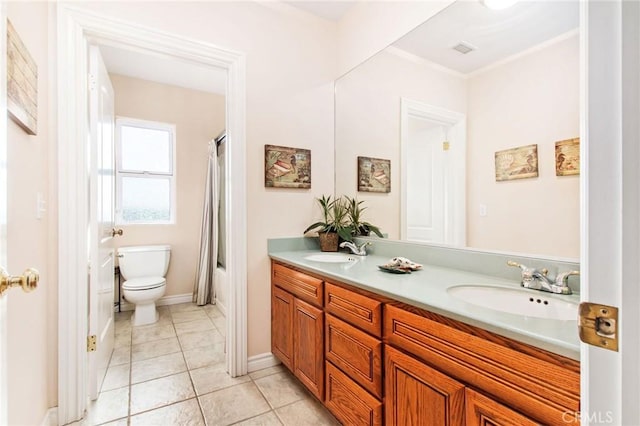 full bathroom featuring tile patterned flooring, vanity, toilet, and shower / tub combo with curtain