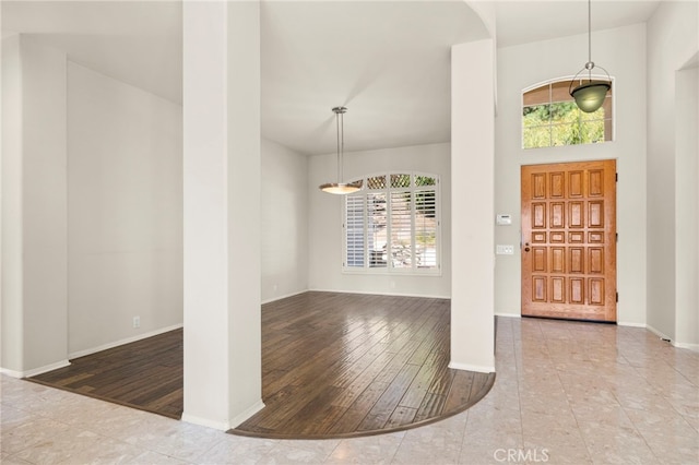 entrance foyer featuring wood-type flooring