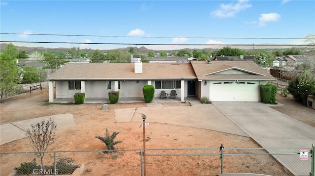 single story home with a garage