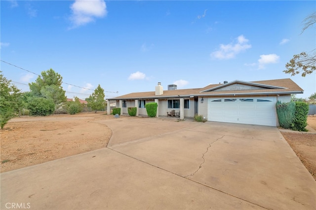 single story home with a garage