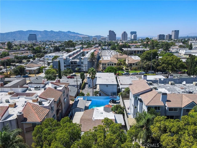 drone / aerial view featuring a mountain view