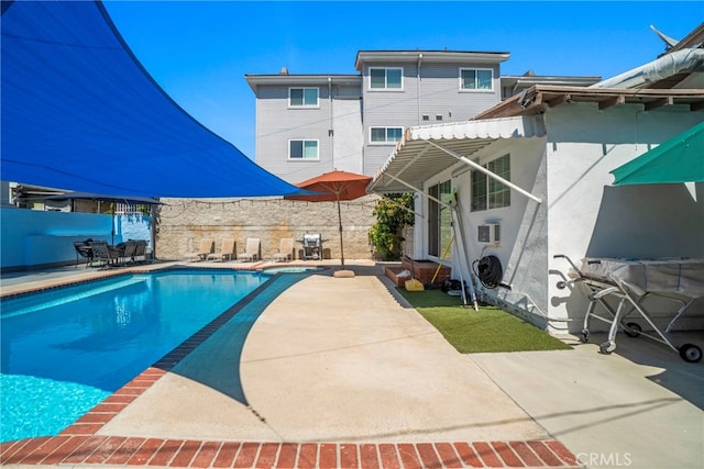 view of pool featuring a patio