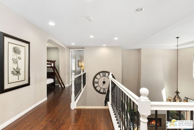 hallway featuring dark wood-type flooring