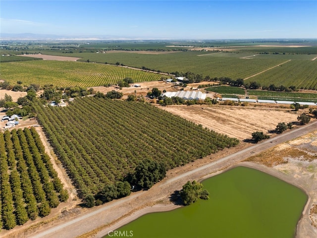 aerial view featuring a rural view and a water view