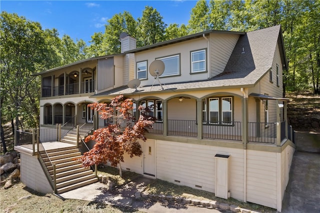 view of front of house with a balcony