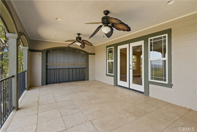 view of patio / terrace featuring ceiling fan